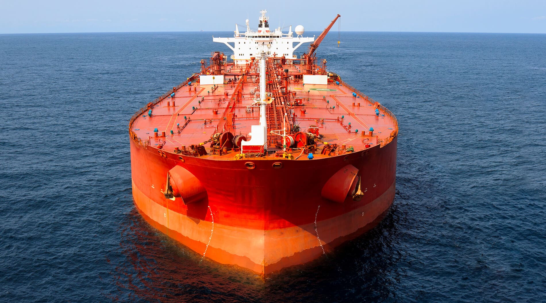 An large red oil tanker requires large ship financing services
